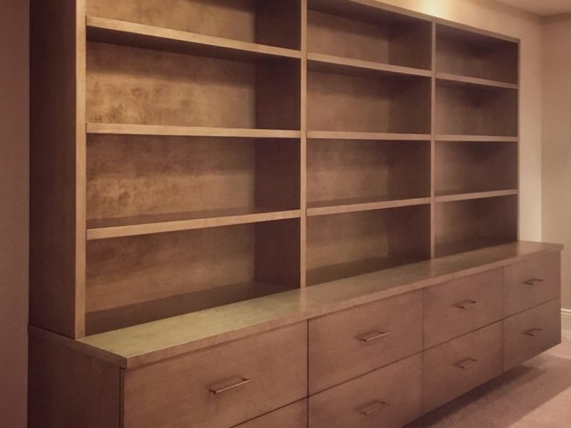 contemporary floating wall unit with a textured silver-gold finish