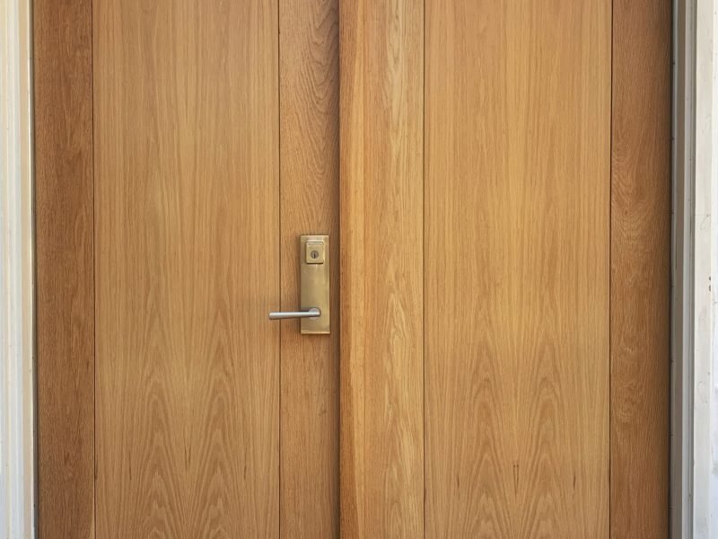 white oak entrance doors with double insulated flat panel